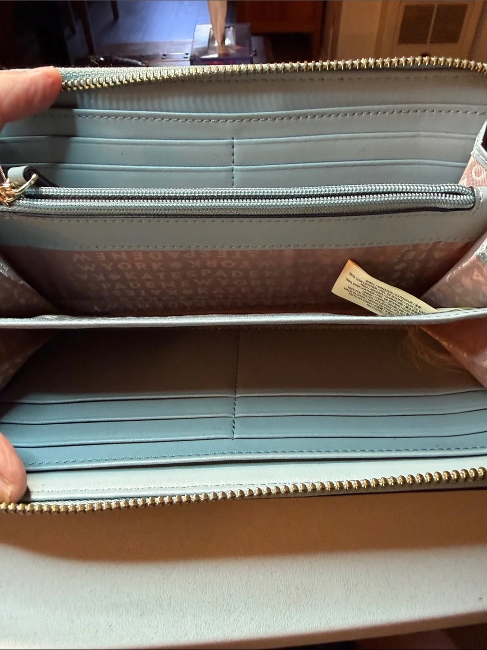 kate spade light blue pebbled gold tone zip-around wallet